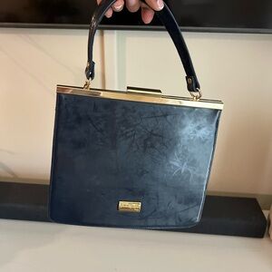 Elegant Navy Blue Handbag with Gold Accents